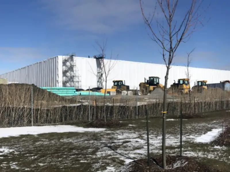Image of construction site covered by oversized tarps